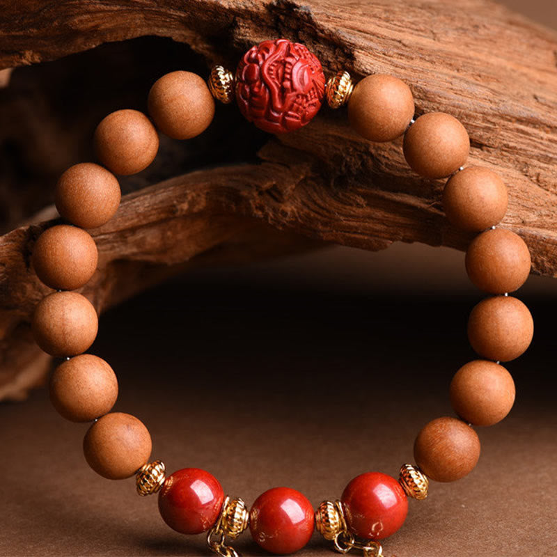 Braccialetto con nappe di ricchezza in legno di pesca naturale tibetano di cinabro PiXiu Buddha Stones