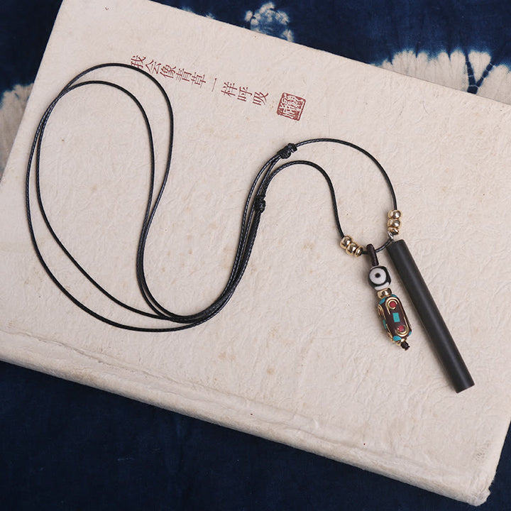 Collana con ciondolo in legno di ebano tibetano Dzi Bead Peace Calm