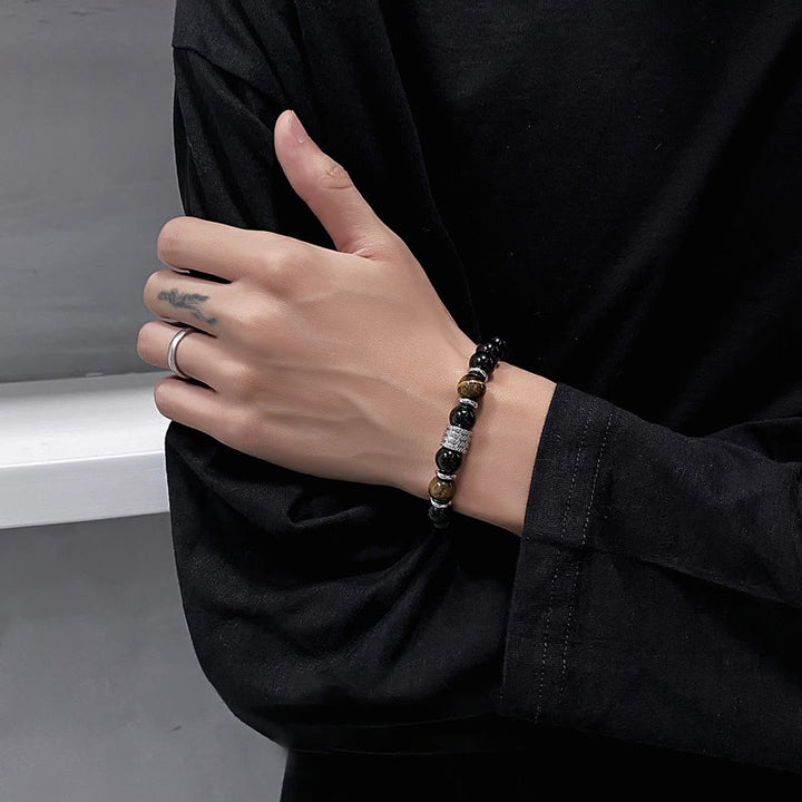 Bracciale Buddha Stones in ossidiana nera naturale con occhio di tigre e forza