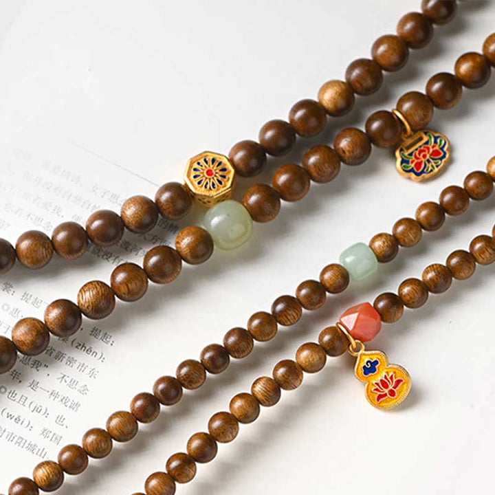 Braccialetto di protezione e calma in palissandro tibetano Buddha Stones Mala