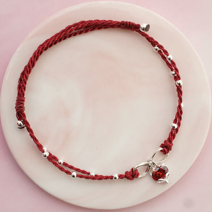 Cavigliera intrecciata con Buddha Stones, simbolo dell'amore, cuore e infinito