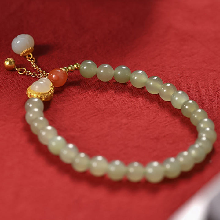 Braccialetto portafortuna in argento sterling 925 con giada Hetian e zucca di loto