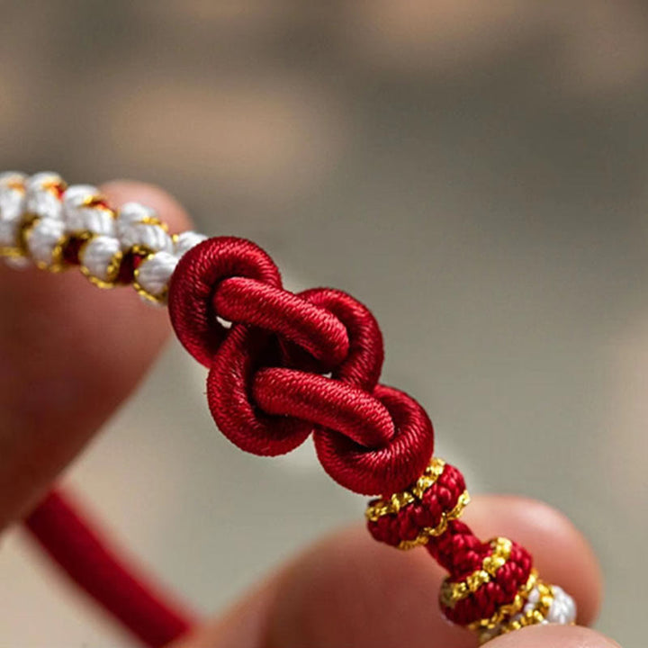 Braccialetto con corda portafortuna con ciondolo a forma di fiore di pesco con nodo d'amore fatto a mano Buddha Stones