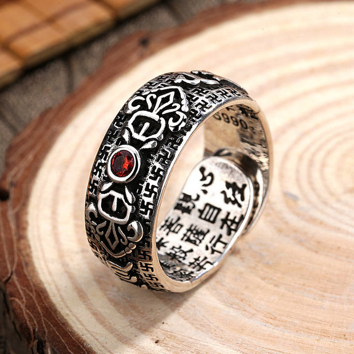 Anello di ricchezza in rame e rubino tibetano