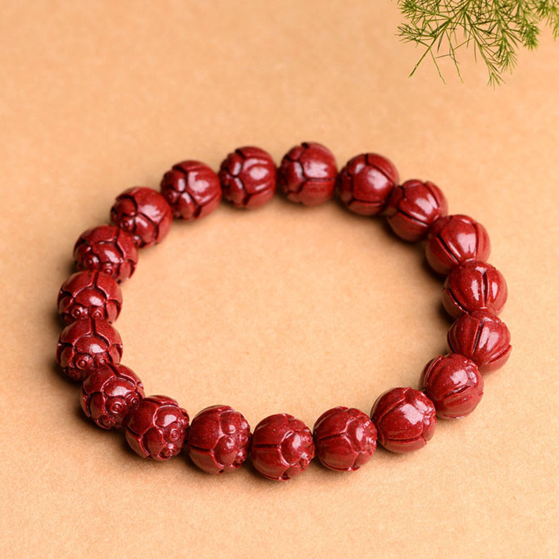 Braccialetto di benedizione del loto con motivo a fregi in cinabro naturale Om Mani Padme Hum Buddha Stones
