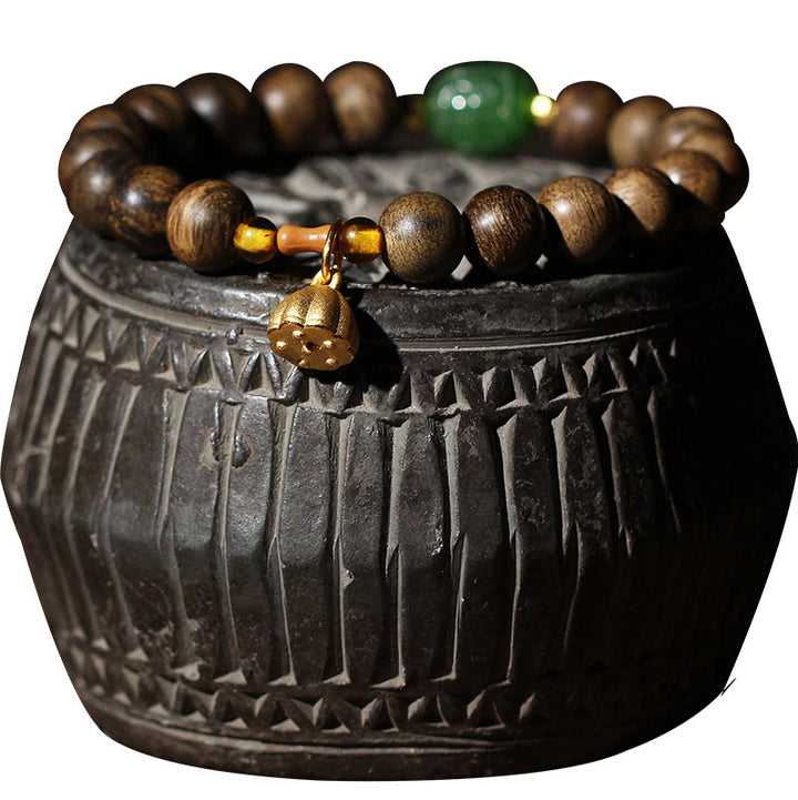 Bracciale Buddha Stones 999 Oro Brunei Agarwood Giada Ciano Fiore di Loto Pace Forza