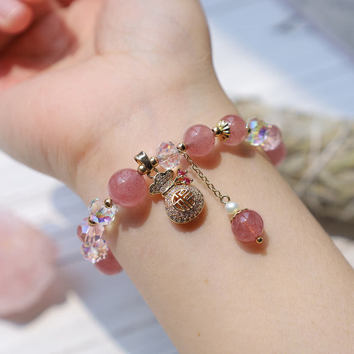 Braccialetto positivo con ciondolo a forma di sacchetto di denaro in cristallo di quarzo fragola naturale Buddha Stones
