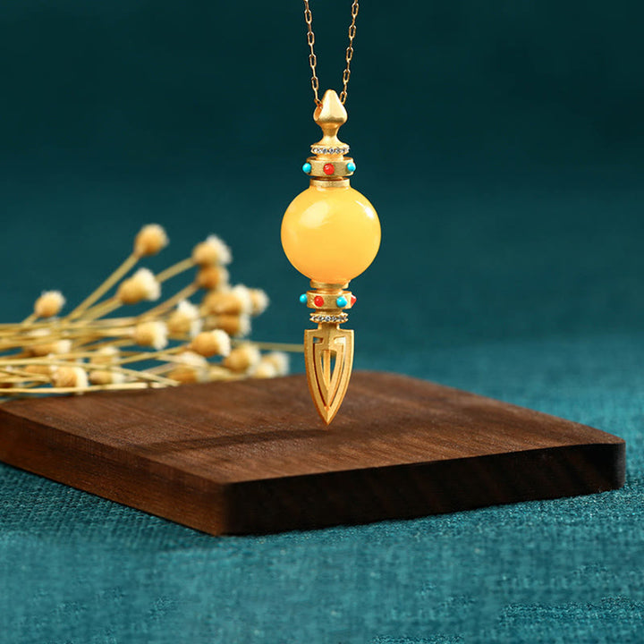 Collana con ciondolo ansia trasparente Dorje Vajra in ambra placcata oro 24K
