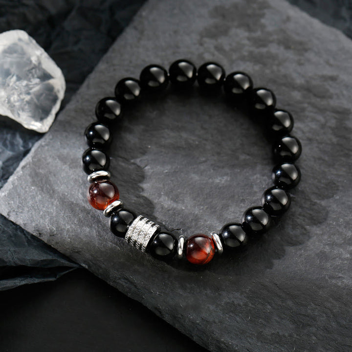 Bracciale Buddha Stones in ossidiana nera naturale con occhio di tigre e forza