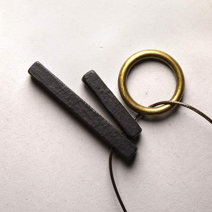 Collana con ciondolo in legno di ebano e cerchio zen Buddha Stones , illuminazione