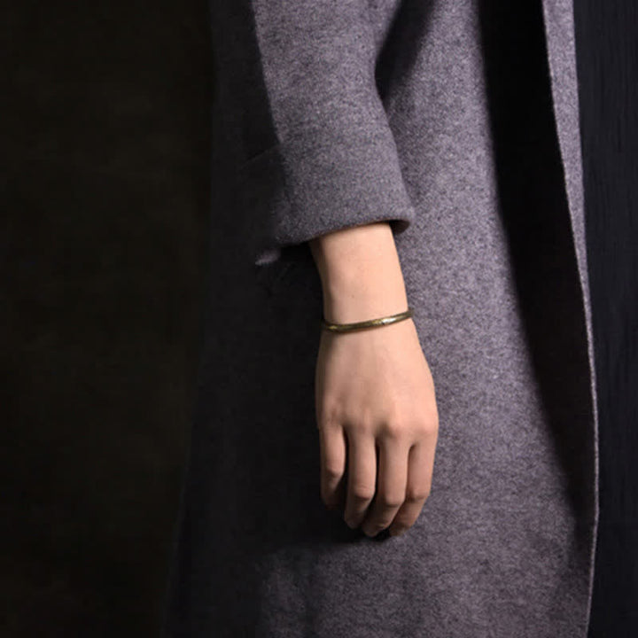 Bracciale regolabile con polsino in rame e design rustico Buddha Stones