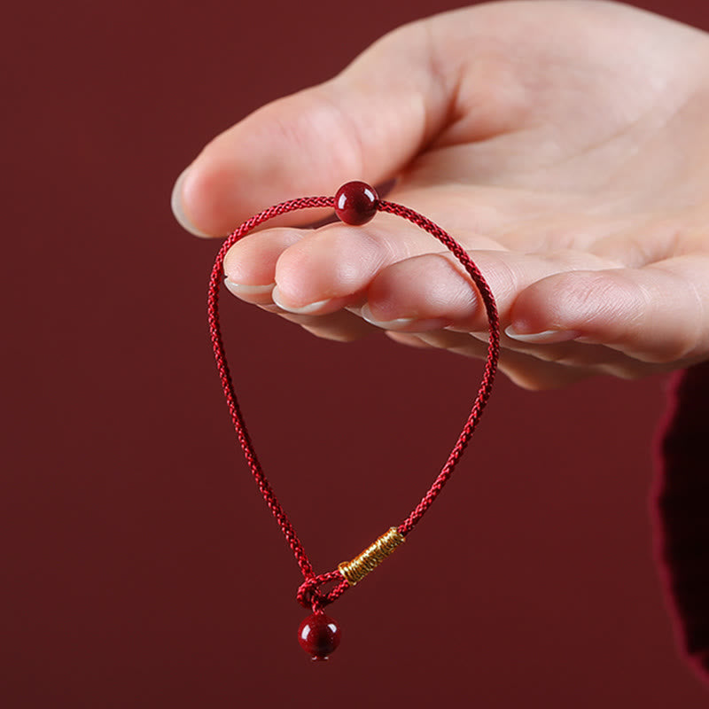 Braccialetto di corda rossa con benedizione in agata rossa naturale e cinabro Buddha Stones