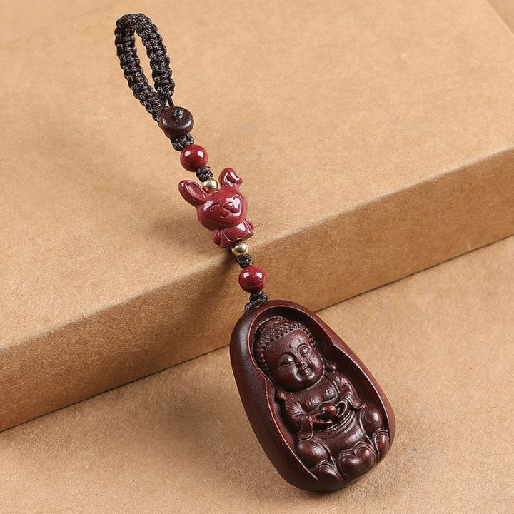 Buddha Stones Piccola foglia Sandalo rosso Buddha Cinabro Zodiaco cinese Amuleto Protezione Portachiavi