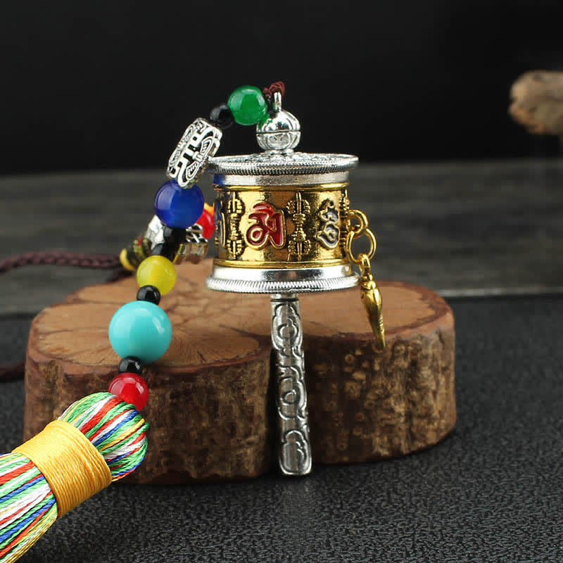 Tibet Om Mani Padme Hum Ruota di preghiera Borsa con nappa Decorazione da appendere all'auto