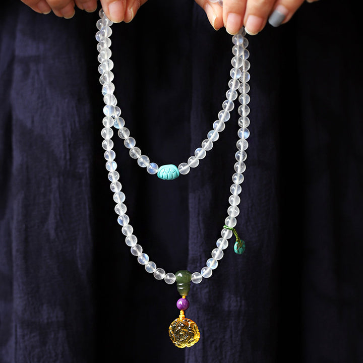 Braccialetto Mala con 108 perle di Buddha Stones , ambra, loto e turchese, per la guarigione con cristalli. - image 2