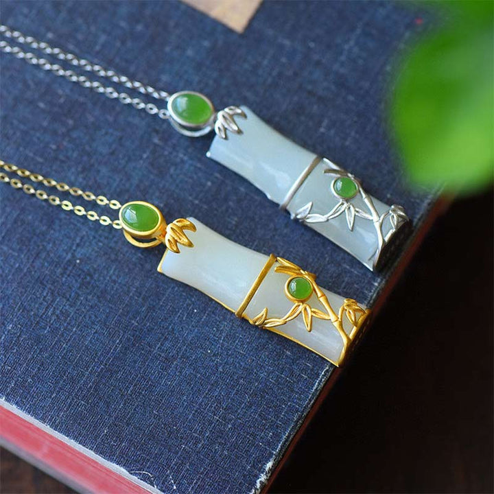 Collana con ciondolo di protezione in giada bianca e giada ciano con Buddha Stones e bambù