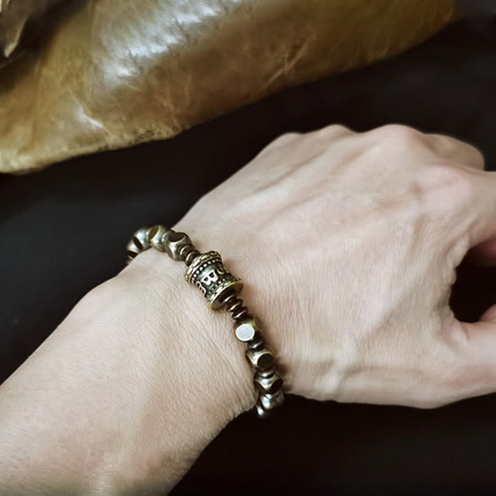 Buddha Stones Tibetano Om Mani Padme Hum Amuleto in ottone intagliato in rame Focus Bracciale