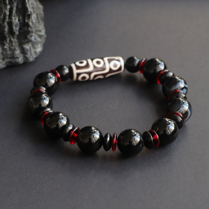 Braccialetto di protezione della ricchezza con perline Dzi a nove occhi in onice nero Buddha Stones