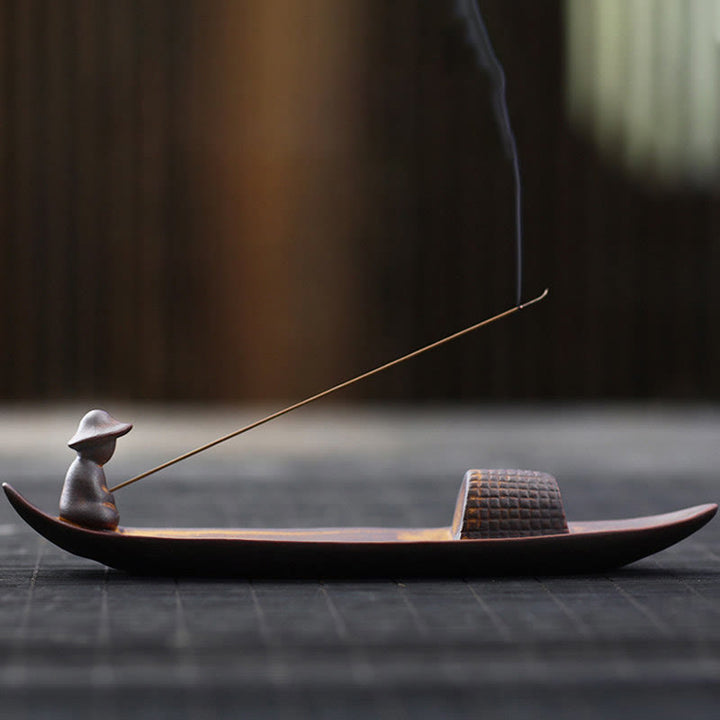 Buddha Stones Un pescatore solitario a galla Bruciatore di incenso curativo in ceramica