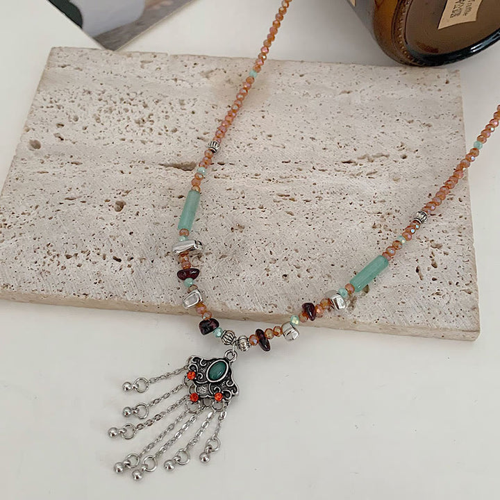 Buddha Stones Pietra di cristallo tibetana Collana pendente con nappa portafortuna in rame