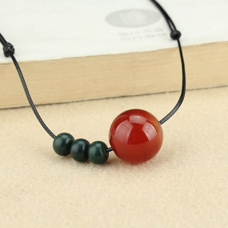 Buddha Stones Agata rossa Avventurina verde Perline di semi di Bodhi verde Collana con ciondolo in corda di cuoio calmo