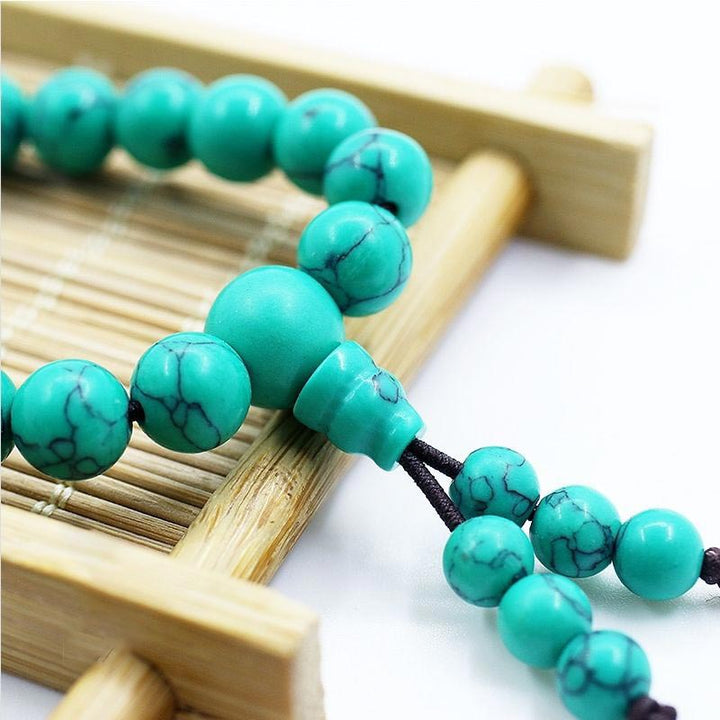 Collana di purificazione Mala in turchese tibetano Buddha Stones