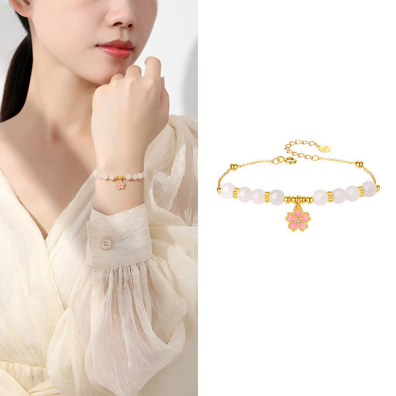 Braccialetto di protezione in giada bianca Hetian con fiori di ciliegio in argento sterling 925 Buddha Stones