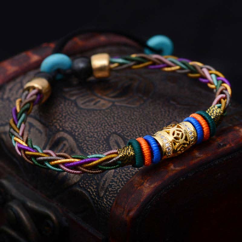 Braccialetto di corda intrecciata con moneta di rame con nodo a otto fili fatto a mano in pietre Buddha Stones tibetano - image 1