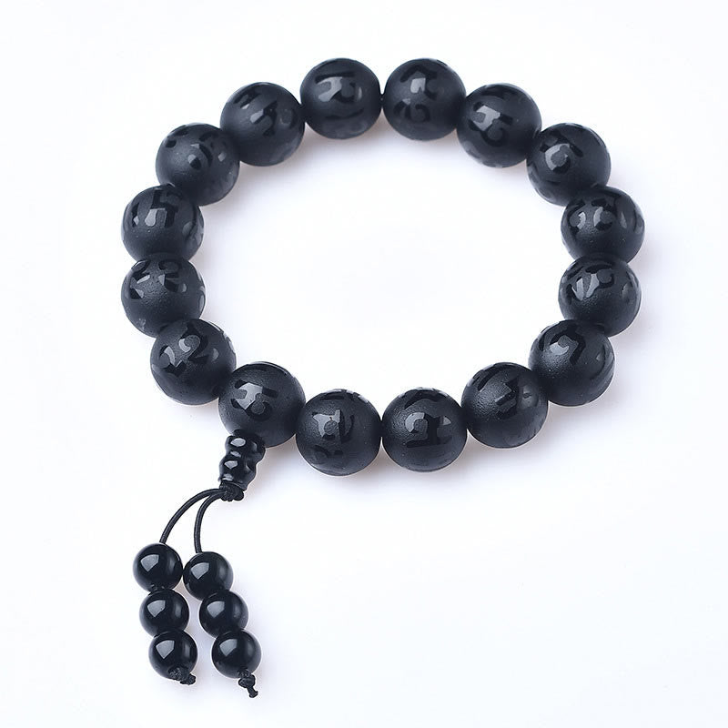 Braccialetto di meditazione Om Mani Padme Hum in onice nero e cristallo bianco del Tibet Buddha Stones