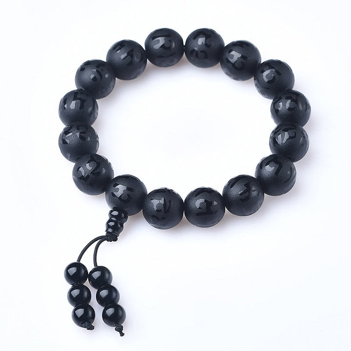 Braccialetto di meditazione Om Mani Padme Hum in onice nero e cristallo bianco del Tibet Buddha Stones