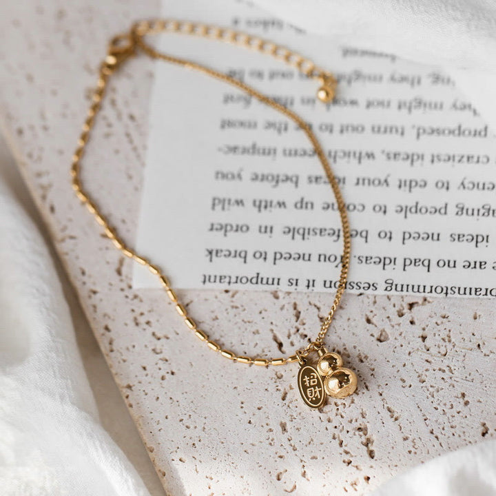 Cavigliera con fibbia della ricchezza e design a zucca portafortuna in oro 18k Buddha Stones