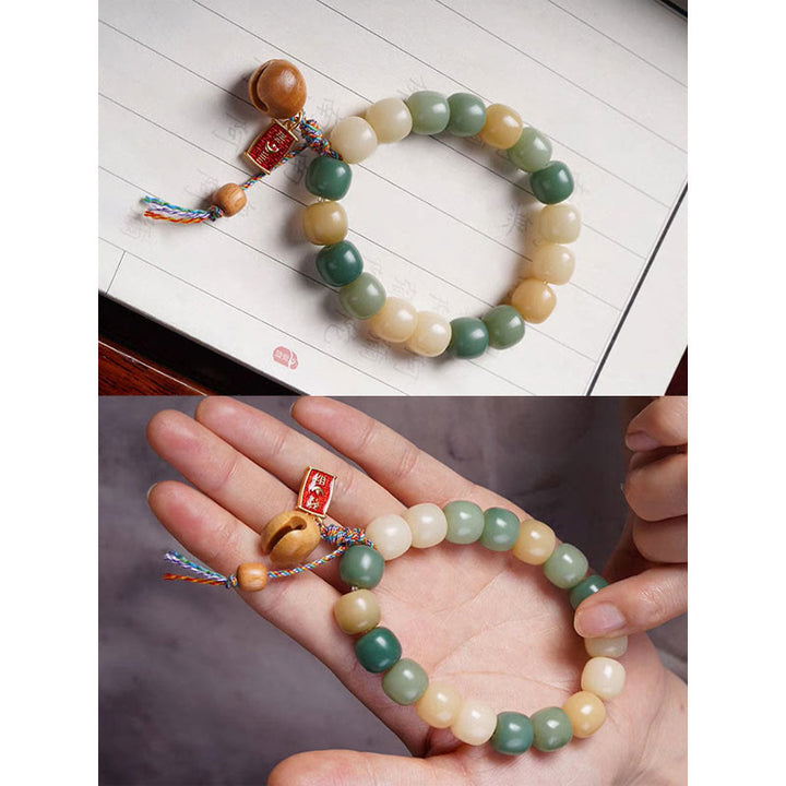 Braccialetto con ciondolo a tamburo di pesce in legno con semi di Bodhi e Buddha Stones, sfumatura naturale