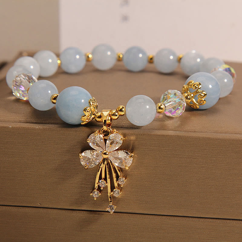 Braccialetto con ciondolo a farfalla in zircone con cristalli rosa e acquamarina Buddha Stones