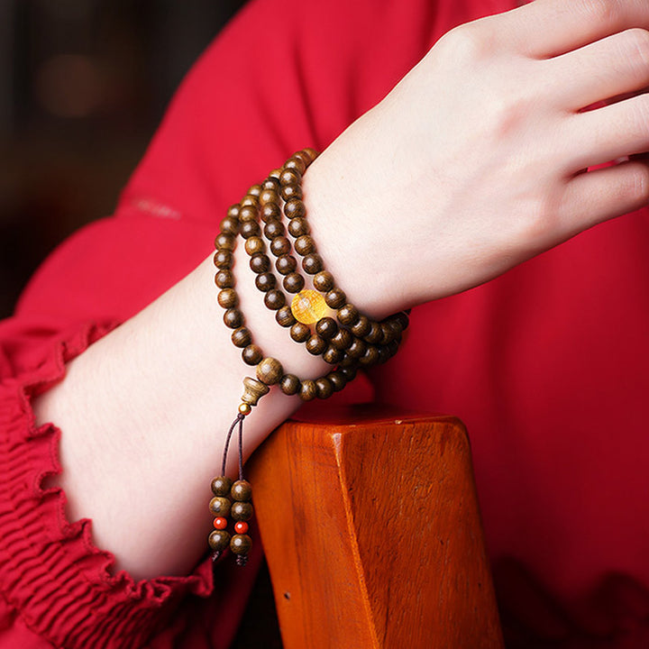 Buddha Stones 108 Mala Beads 999 Oro Brunei Agarwood Cuore Sutra Ambra Agata Rossa Forza Bracciale Meditazione