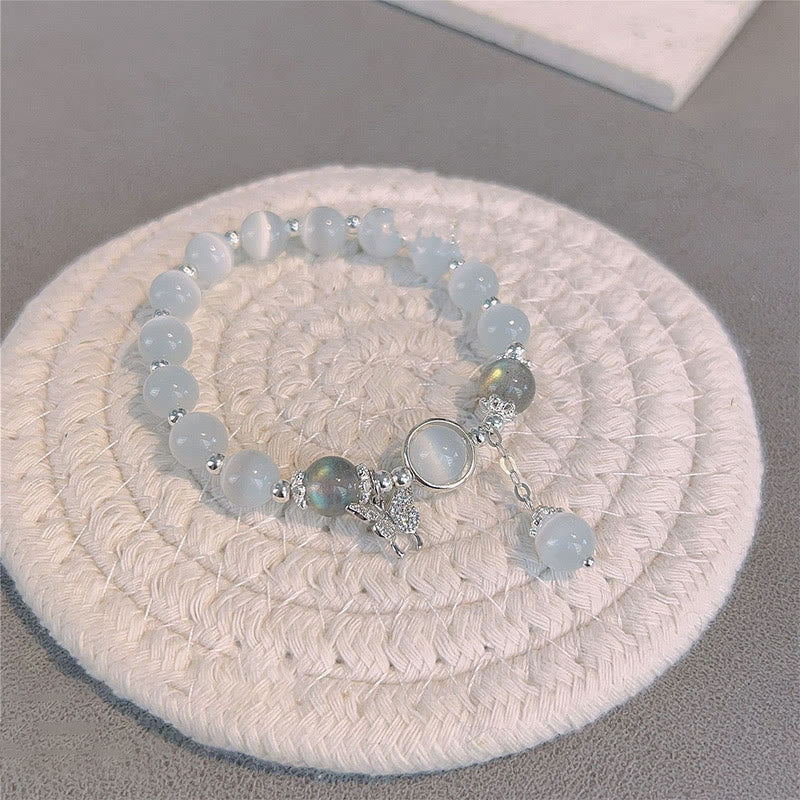 Braccialetto di supporto con ciondolo a forma di stella a forma di farfalla, pietra di luna e occhio di gatto Buddha Stones