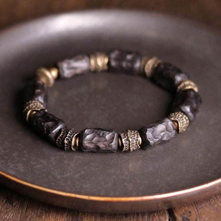 Braccialetto Buddha Stones Tibetano Ebano Legno Rame Calma Pace