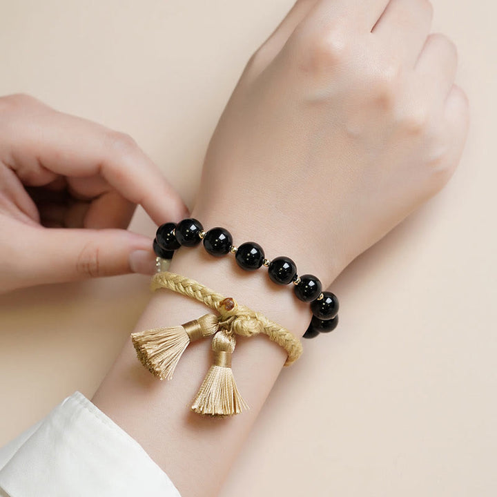 Braccialetto di supporto e protezione con perline di onice nero Buddha Stones 2 pezzi