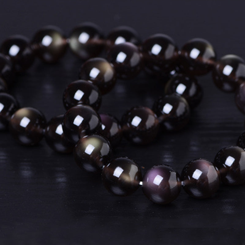 Braccialetto positivo in ossidiana arcobaleno naturale Buddha Stones