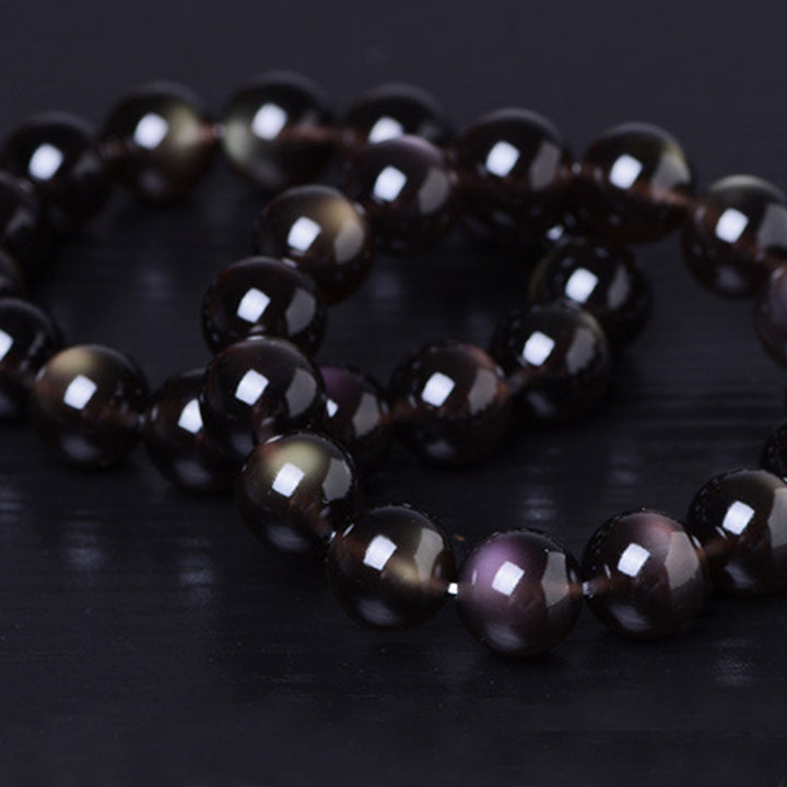 Braccialetto positivo in ossidiana arcobaleno naturale Buddha Stones