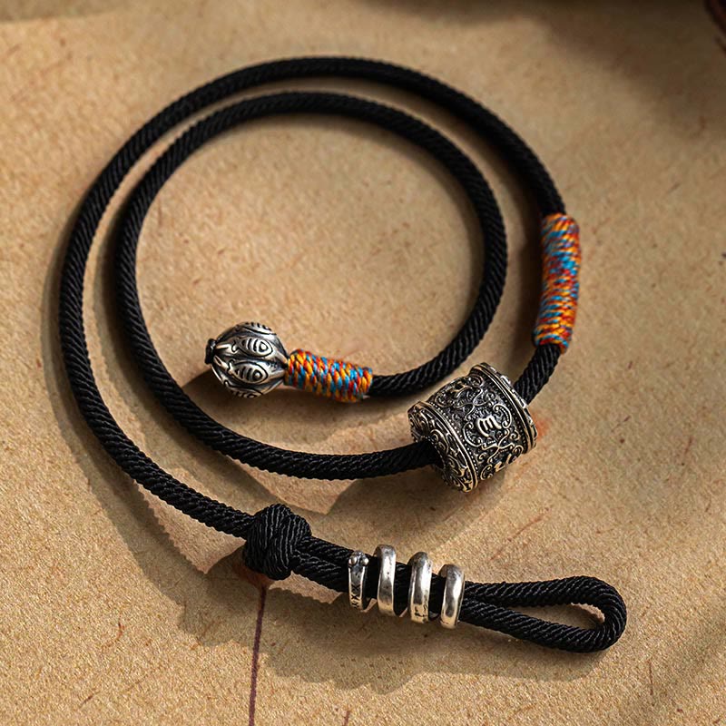 Braccialetto a doppio giro con amuleto intagliato in Buddha Stones tibetano Om Mani Padme Hum
