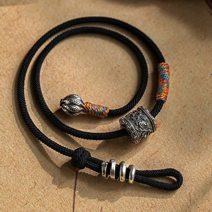 Braccialetto a doppio giro con amuleto intagliato in Buddha Stones tibetano Om Mani Padme Hum