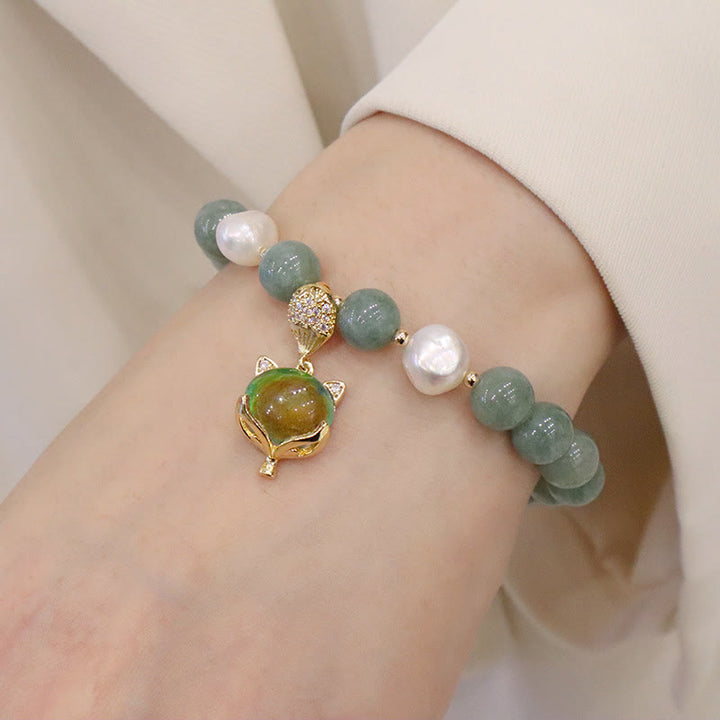 Braccialetto portafortuna con ciondolo volpe che cambia colore, perle di giada e Buddha Stones