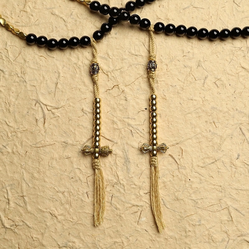 Buddha Stones Tibetano 108 Mala Beads Onice Nero Tre Occhi Dzi Beads Bracciale di Protezione