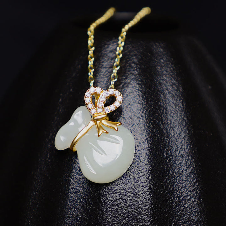 Collana con ciondolo a forma di borsa porta soldi in giada bianca naturale Hetian Buddha Stones