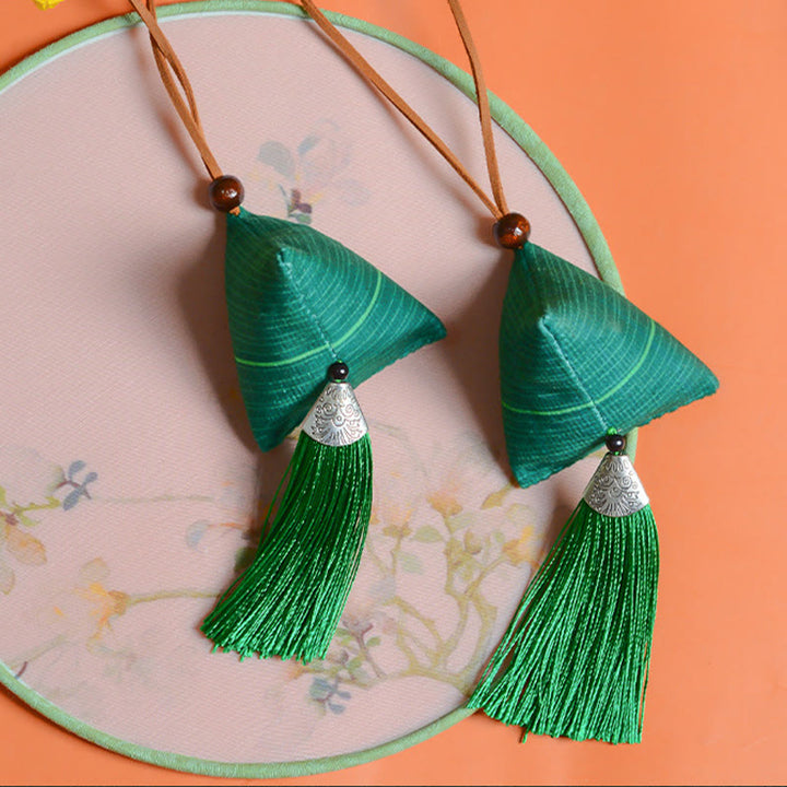 Decorazione appesa con nappa di protezione del sacchetto del modello Zongzi del festival delle barche drago Buddha Stones