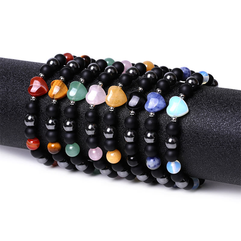 Braccialetto di protezione del cuore dell'amore di cristallo della pietra dell'occhio di tigre di onice nero Buddha Stones