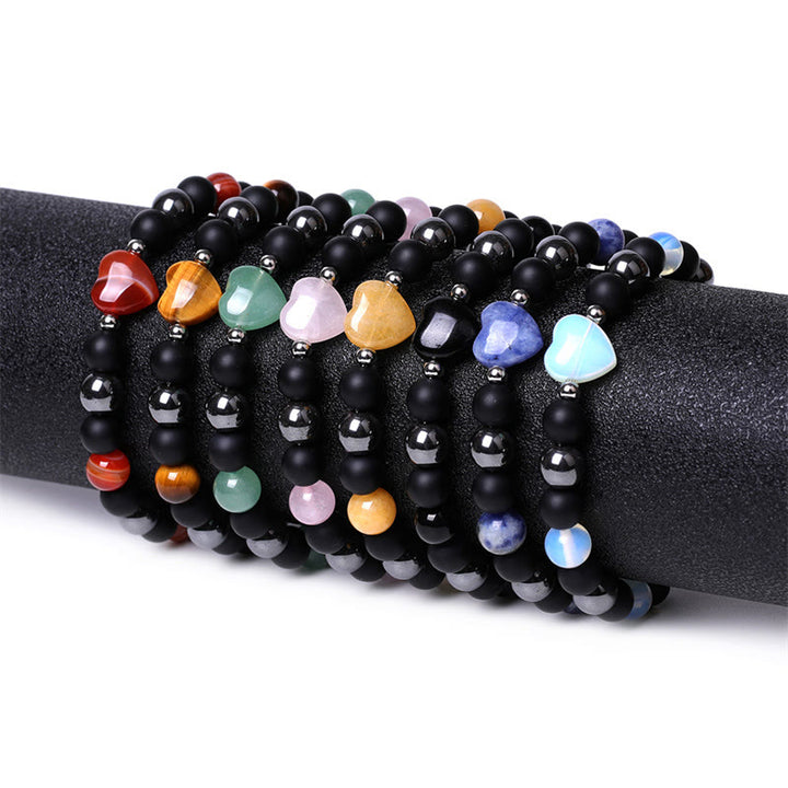 Braccialetto di protezione del cuore dell'amore di cristallo della pietra dell'occhio di tigre di onice nero Buddha Stones