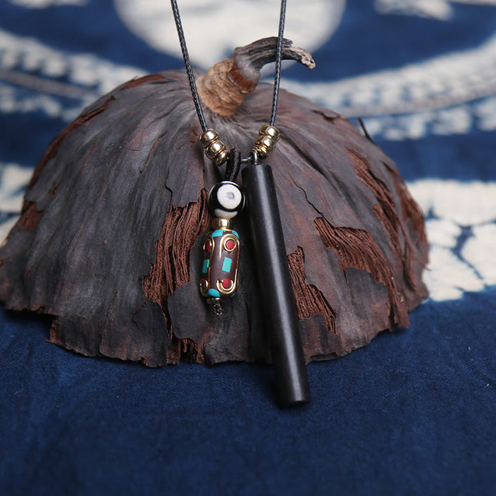 Collana con ciondolo in legno di ebano tibetano Dzi Bead Peace Calm
