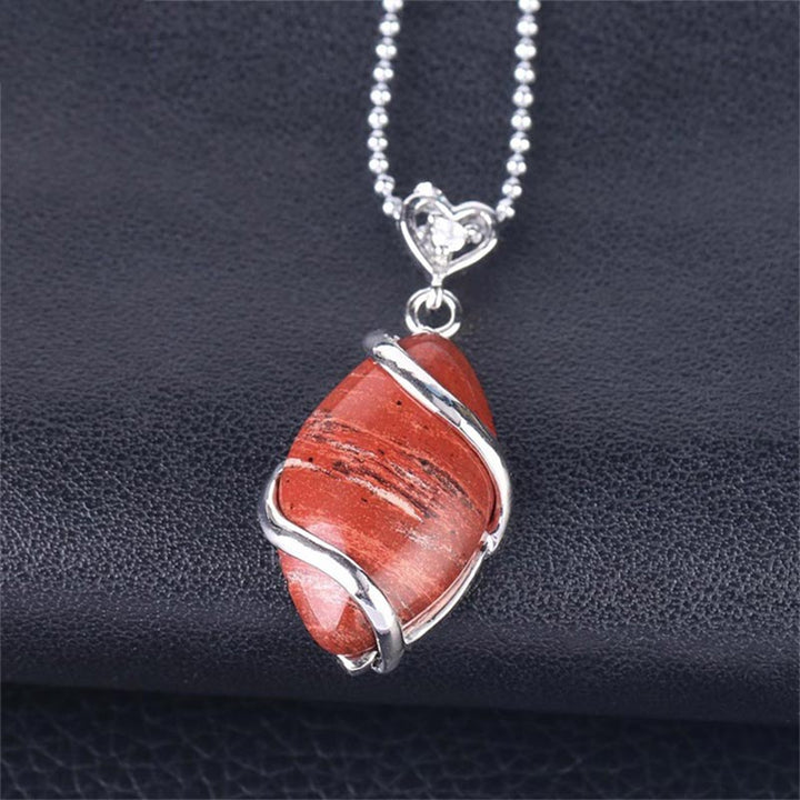Collana con ciondolo in pietra di cristallo naturale con motivo a marquise Buddha Stones