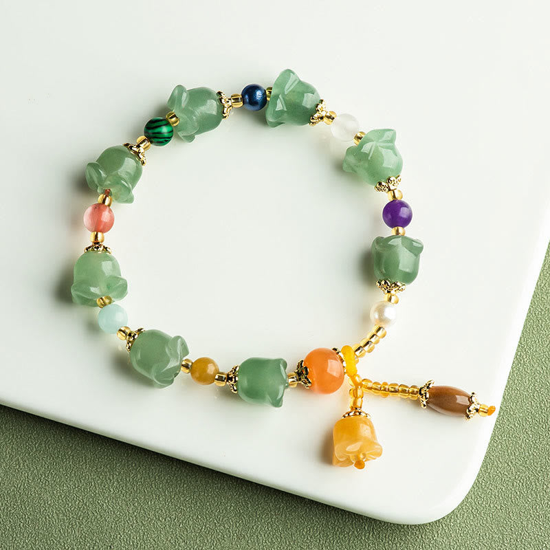 Braccialetto della fortuna con fiore di magnolia, avventurina verde Buddha Stones